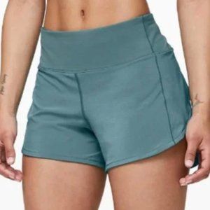 Lululemon Speed Up Mid rise 4" shorts in Aquatic Green